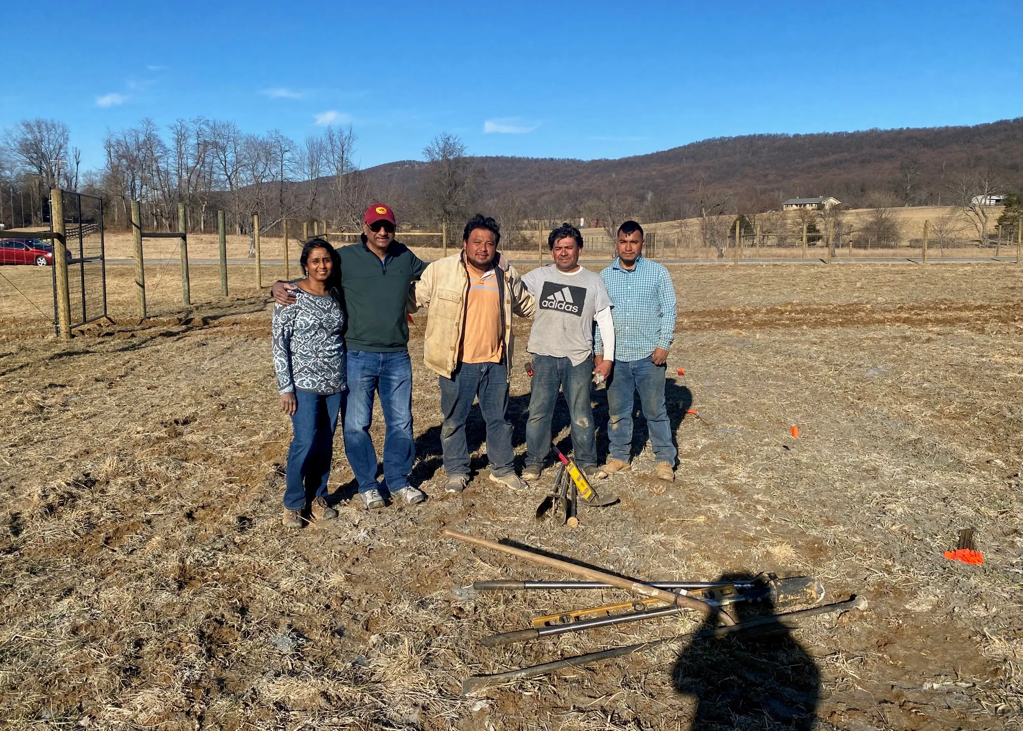 Team standing in the vineyard